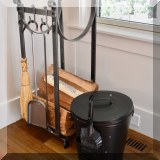 D08. Fireplace tools and wood holder. 